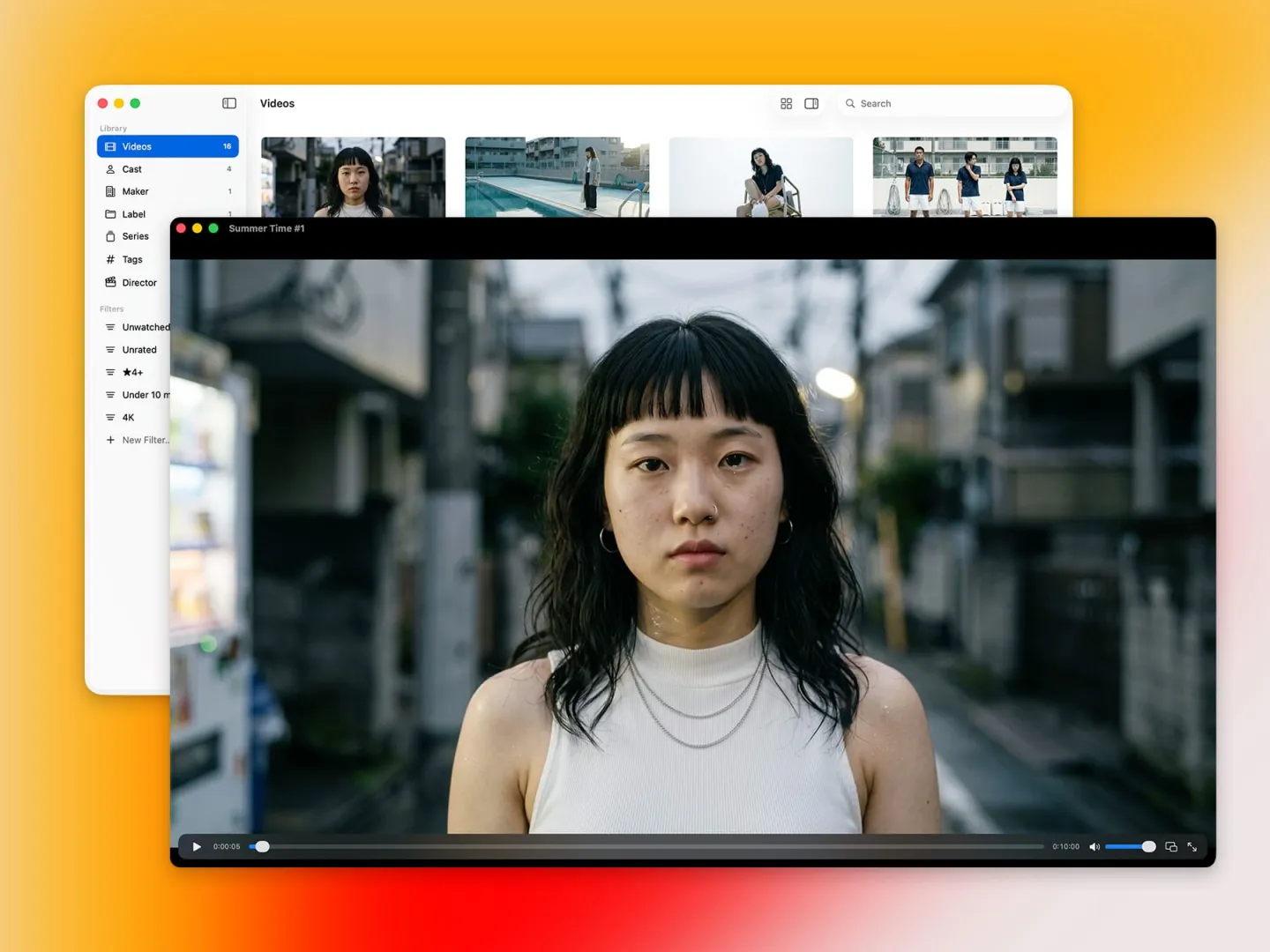 A playback window in front of the main window, showing a video with play controls, a scrubber and a volume slider.
